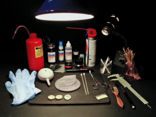 تمیزکاری قطعات اپتیکی